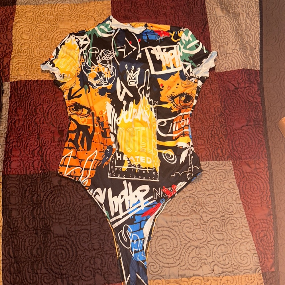 A cool graffiti type shirt, I’ve only wore it once.